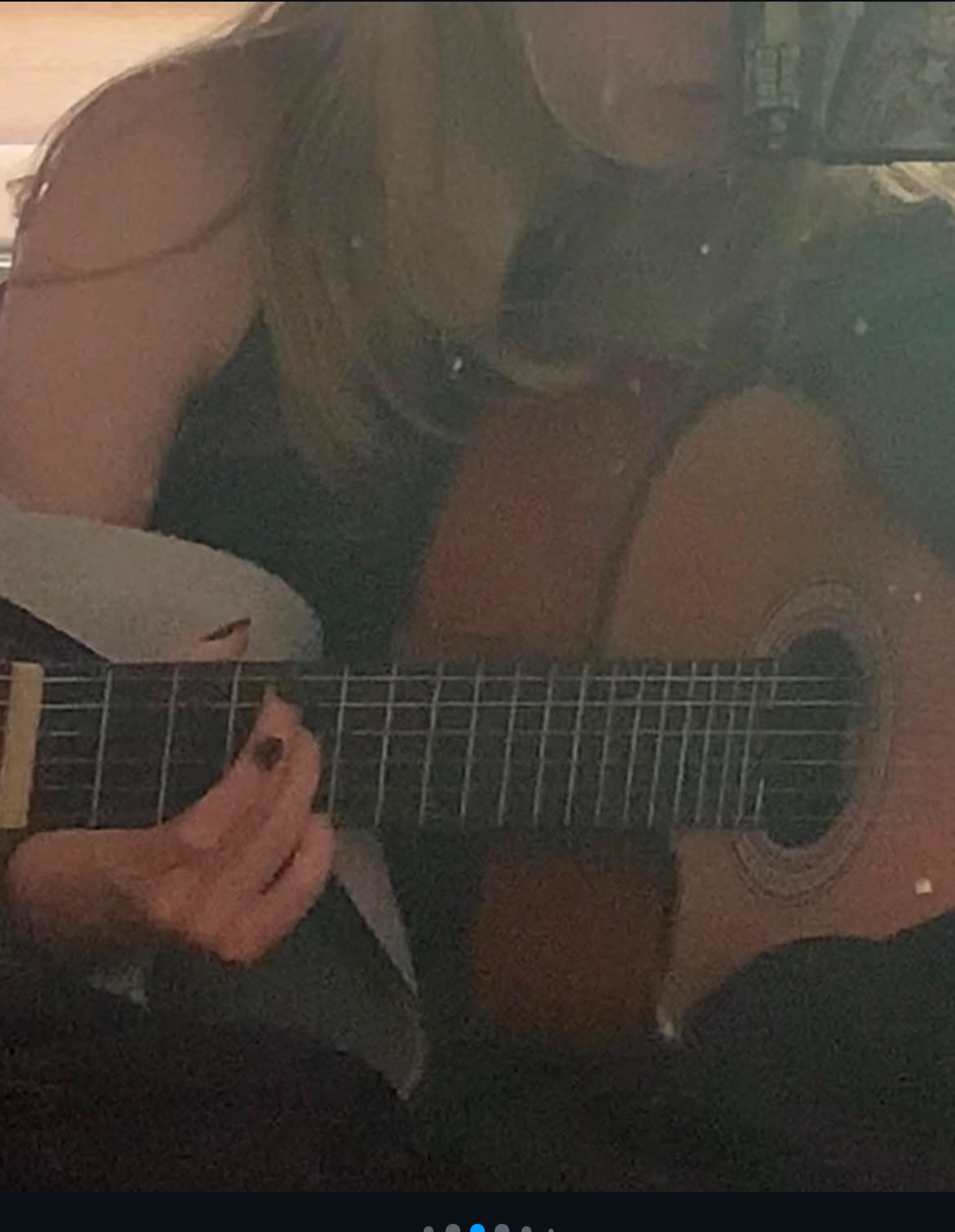Playing guitar